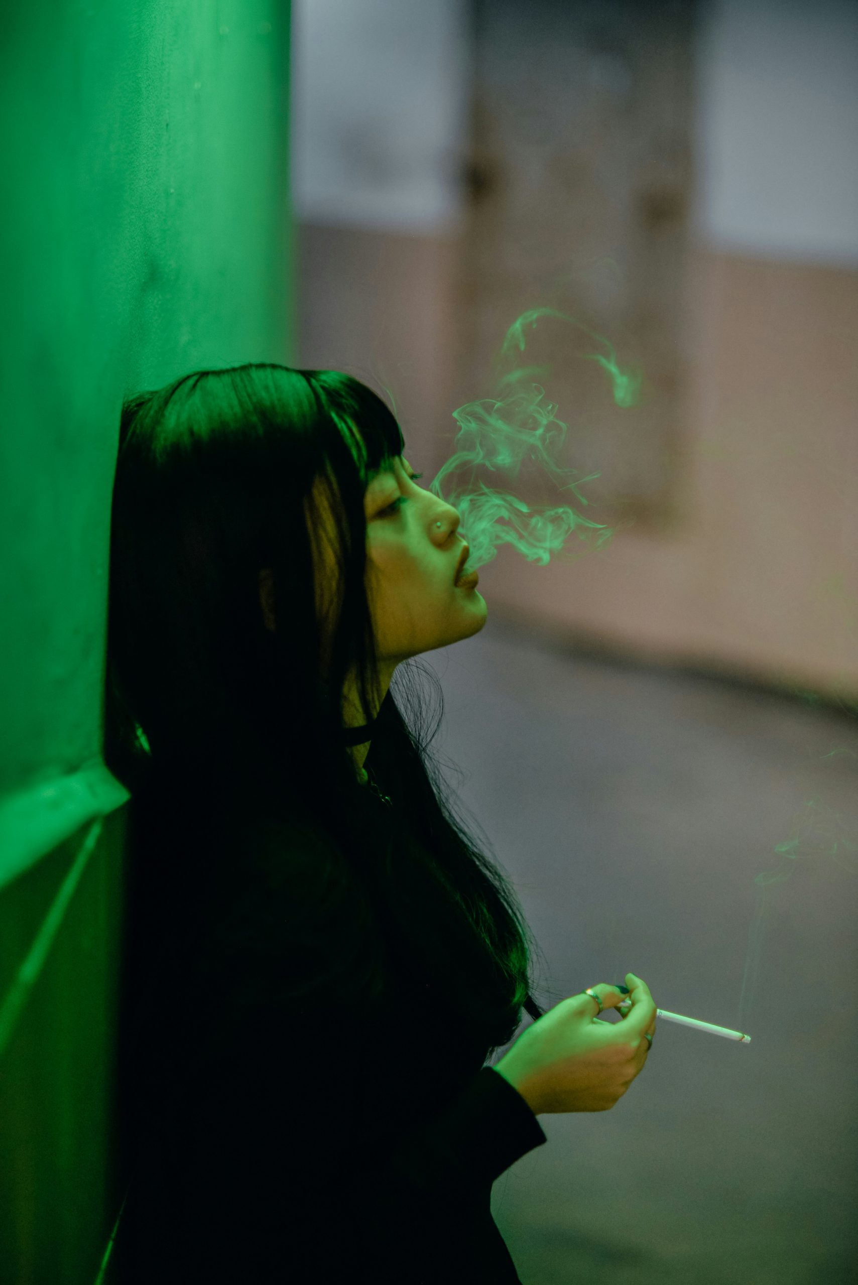 Home woman-smoking-a-cigarette